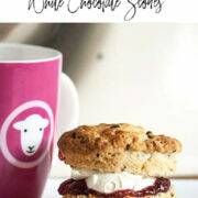 Raspberry white chocolate scones are a perfect afternoon tea treat, filled with fruity raspberry jam and clotted cream.