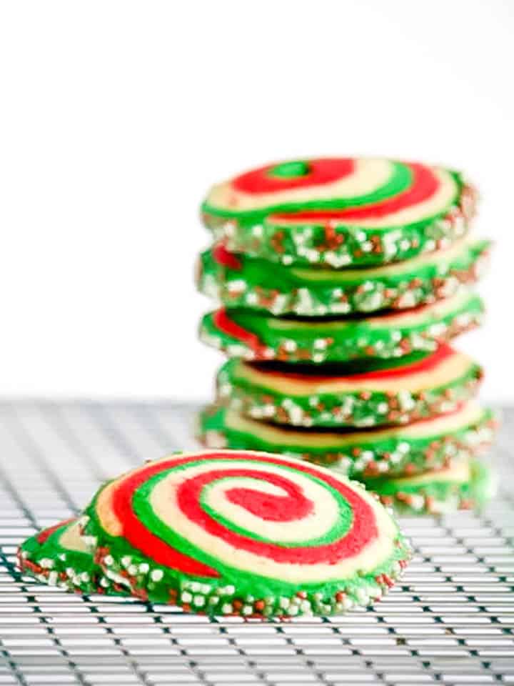 Stack of green, red and white sugar Christmas pinwheel cookies