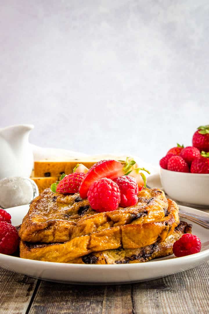 Classic french toast made with brioche topped with fresh summer fruits