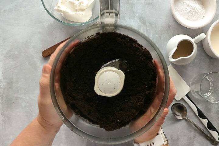 Oreo crumb and butter mixture in a food processor