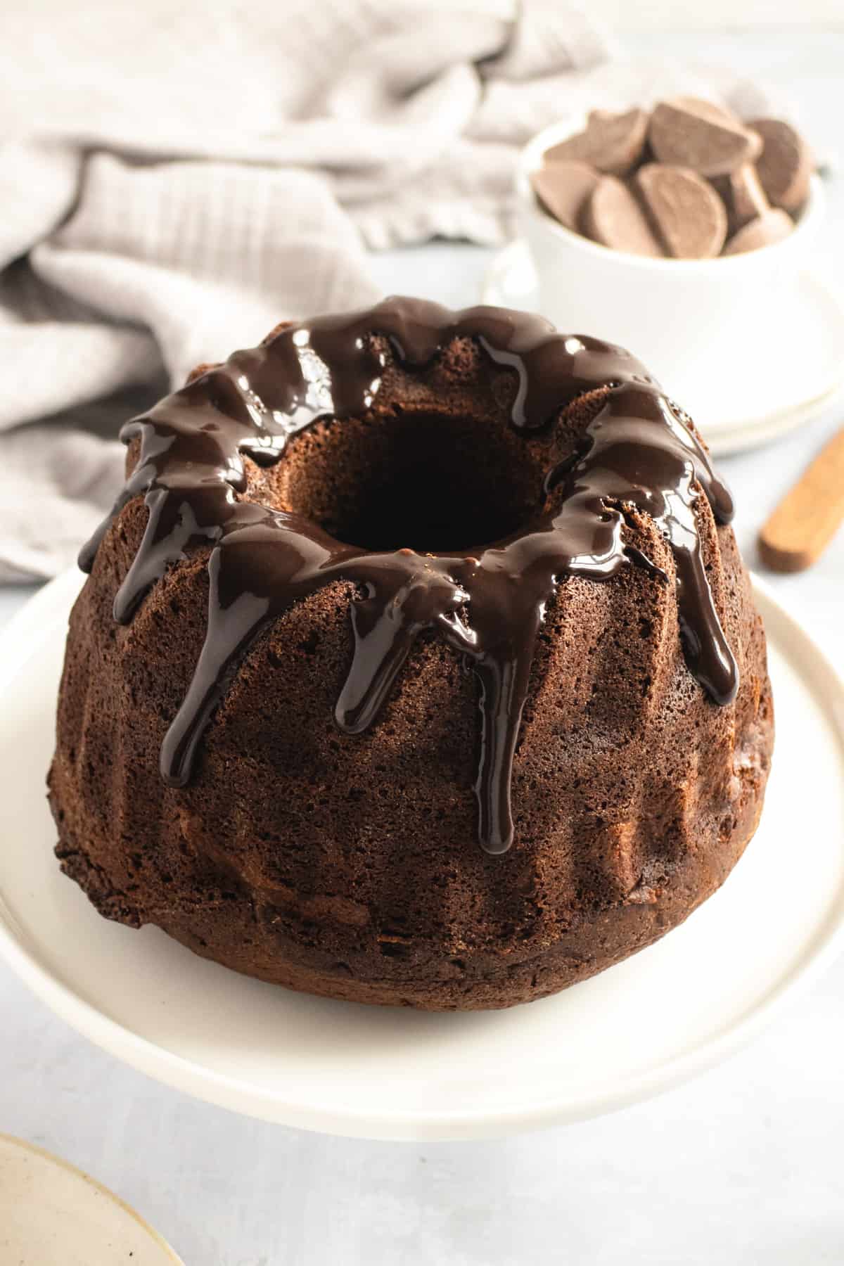 Chocolate glaze drizzled over the top of a cake