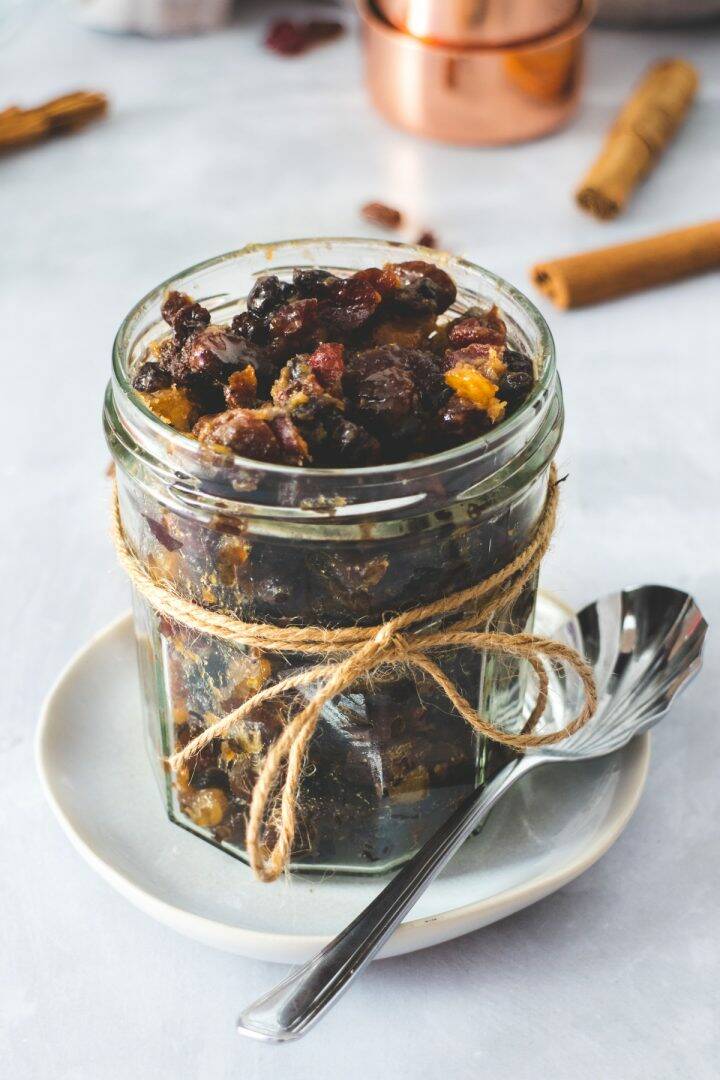 Easy homemade mincemeat in a jar with a spoon
