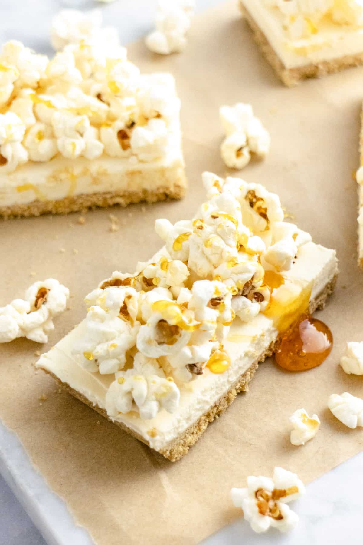Popcorn cheesecake bar drizzled with caramel sauce
