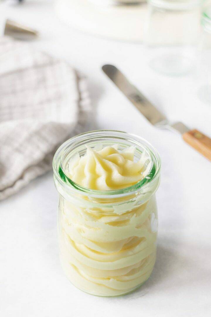 Buttercream swirled into a glass jar