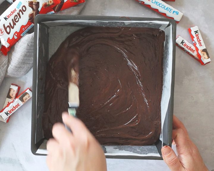 Spreading brownie batter in a baking pan
