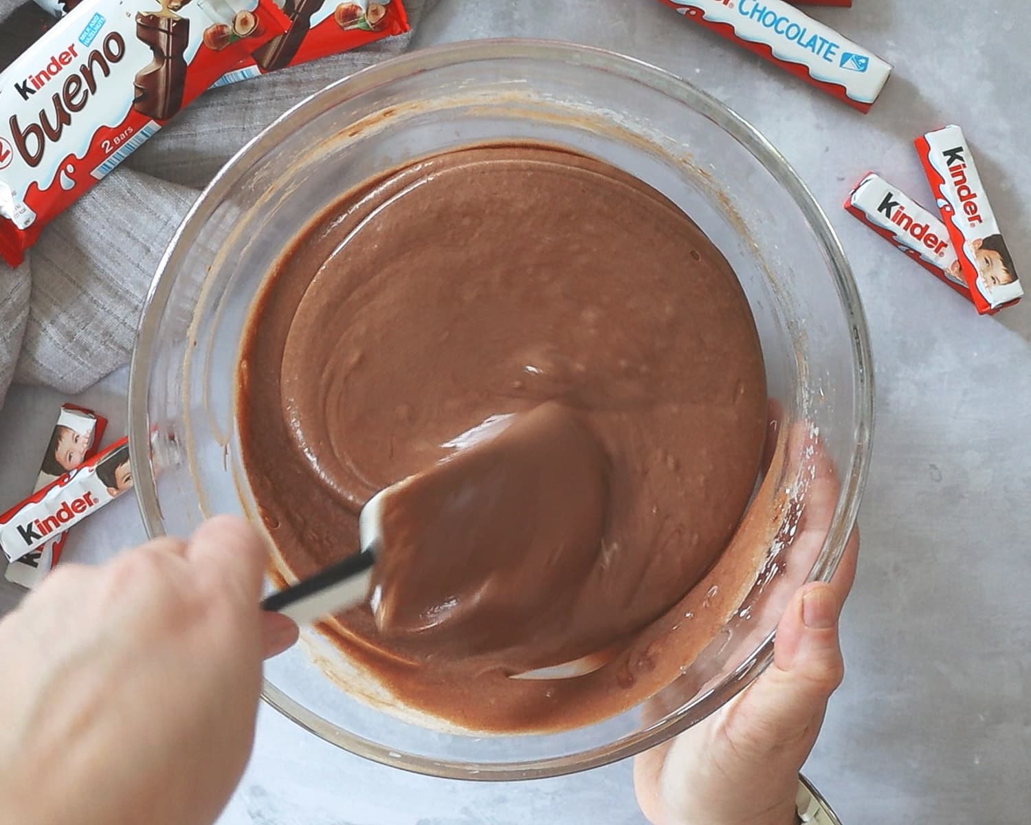 Mixing chocolate batter with a rubber spatula
