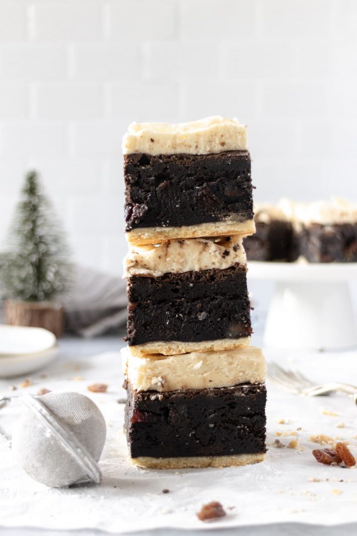 Stacked mince pie brownies dusted with icing sugar