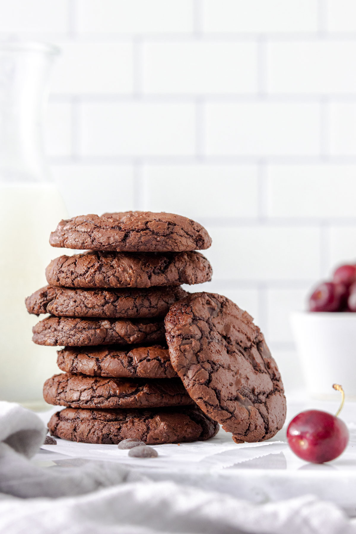 Stack of chocolate brownie cookies on a marble plate