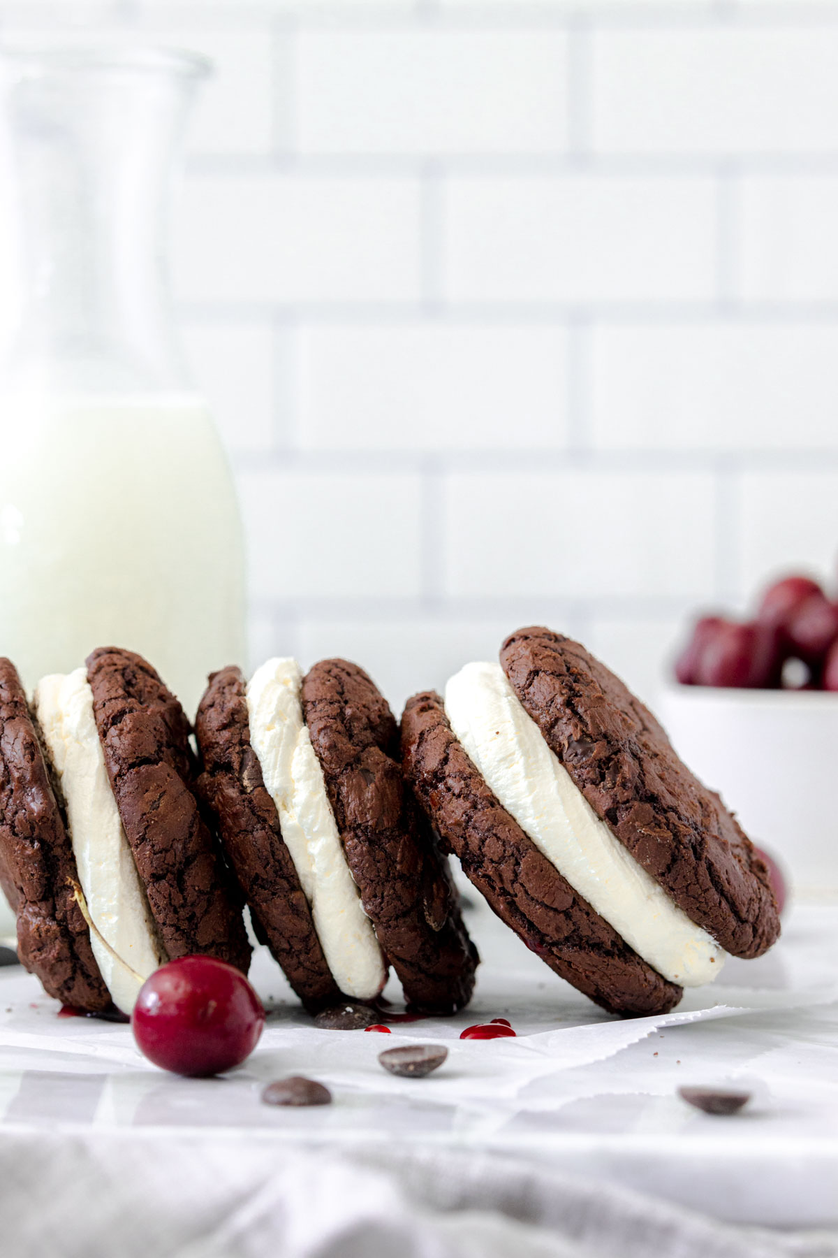 Black Forest brownie cookie sandwiches in a row